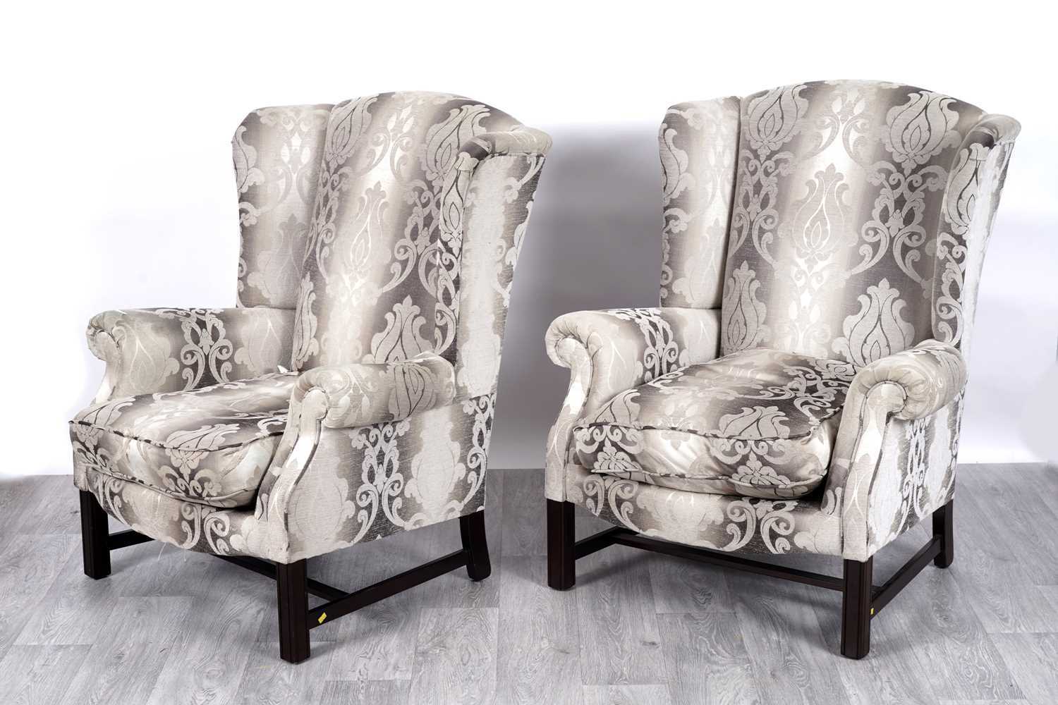 Lot 62 - Parker Knoll: a pair of Georgian-style armchairs