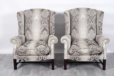 Lot 62 - Parker Knoll: a pair of Georgian-style armchairs