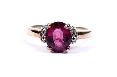 Lot 77 - A pink tourmaline and diamond ring