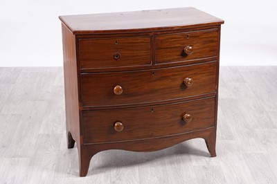 Lot 64 - A Victorian mahogany bowfront chest of two short over three long drawers