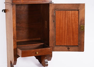 Lot 56 - An Arts & Crafts style mahogany hanging cabinet