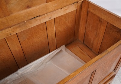 Lot 57 - A late 19th-Century oak mule chest
