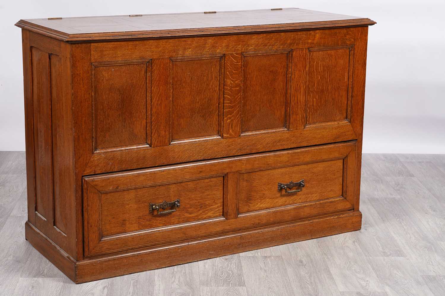 Lot 57 - A late 19th-Century oak mule chest