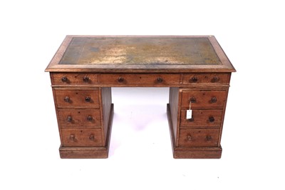Lot 637 - Howard & Sons: A Victorian oak pedestal desk