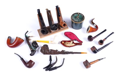 Lot 378 - A collection of pipes; and a brass tobacco jar and lid