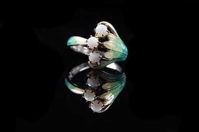 Lot 87 - An Edwardian style Art Nouveau opal and basse-taille enamel ring