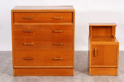 Lot 63 - G Plan: a ‘Brandon’ oak chest of four drawers; and a matching bedside cabinet