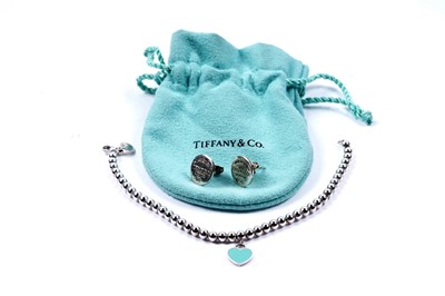 Lot 115 - A Tiffany & Co silver bracelet; and a pair of Tiffany & Co earrings