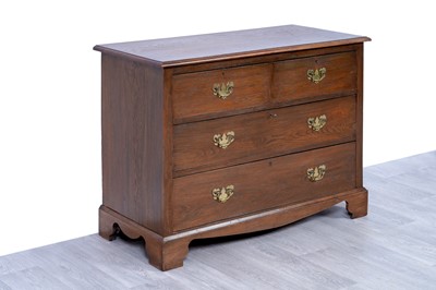 Lot 10 - A Georgian-style oak chest of drawers