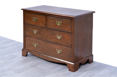 Lot 10 - A Georgian-style oak chest of drawers