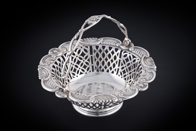 Lot 74 - A late Victorian silver swing-handled bonbon dish