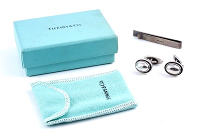 Lot 526 - A Tiffany & Co silver tie clip; and a pair of Georg Jensen silver cufflinks