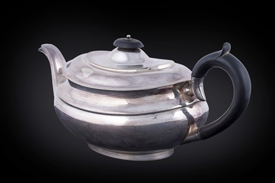 Lot 22 - A George V silver teapot