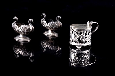 Lot 560 - A Victorian/Edwardian silver drum form mustard pot; and a pair of swan pattern salt cellars
