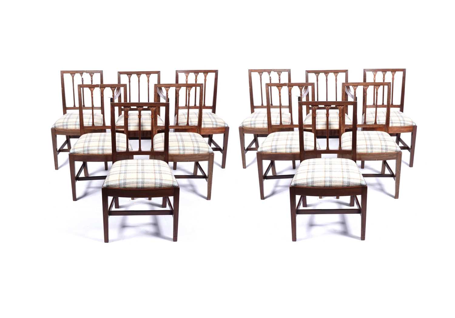 Lot 59 - A set of twelve Regency style mahogany dining chairs