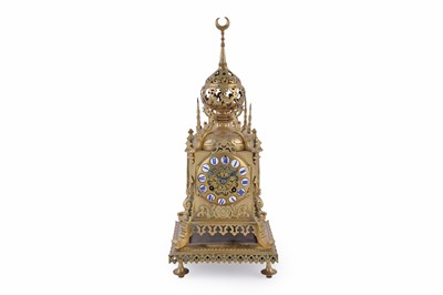 Lot 576 - An early 20th Century brass cased mantle clock