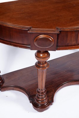 Lot 61 - A Victorian mahogany demilune console table
