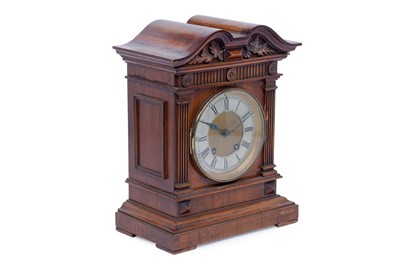 Lot 181 - Lenzkirch: a walnut 8-day mantel clock