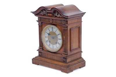 Lot 181 - Lenzkirch: a walnut 8-day mantel clock