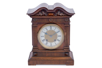 Lot 181 - Lenzkirch: a walnut 8-day mantel clock