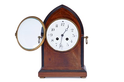 Lot 182 - An Edwardian inlaid mahogany mantel clock