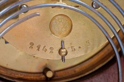 Lot 182 - An Edwardian inlaid mahogany mantel clock