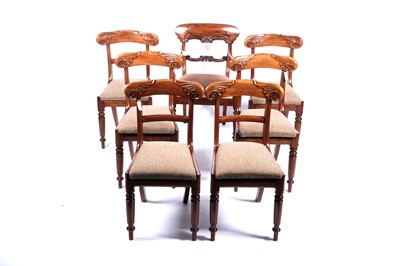 Lot 69 - A set of six Victorian mahogany dining chairs; and a similar carver