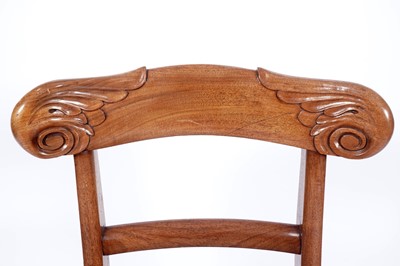 Lot 69 - A set of six Victorian mahogany dining chairs; and a similar carver