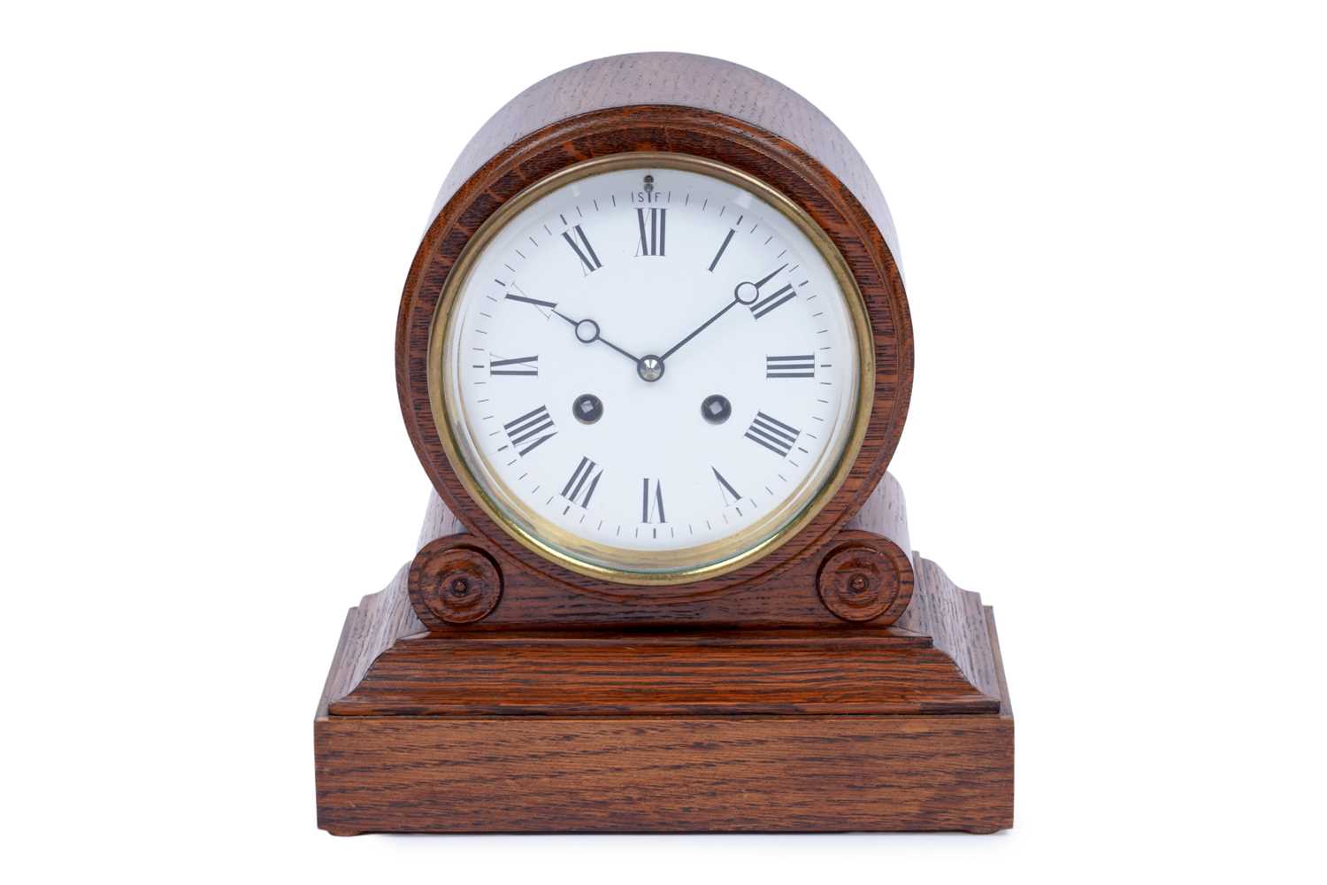 Lot 184 - An early 20th Century oak 8-day mantel clock