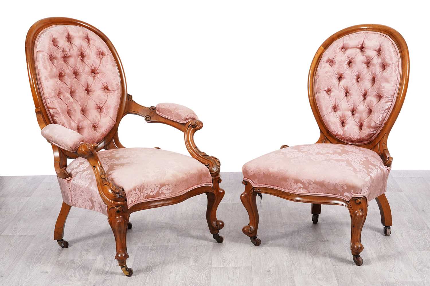 Lot 73 - A Victorian walnut pair of chairs