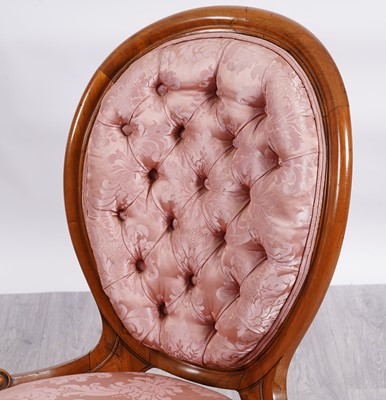 Lot 73 - A Victorian walnut pair of chairs