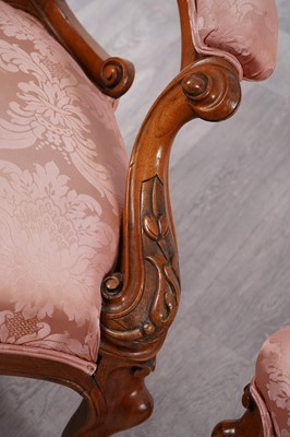 Lot 73 - A Victorian walnut pair of chairs