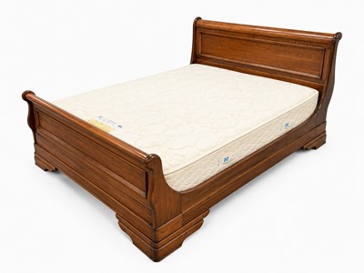Lot 75 - Willis Gambier Limited: a French cherrywood sleigh bed
