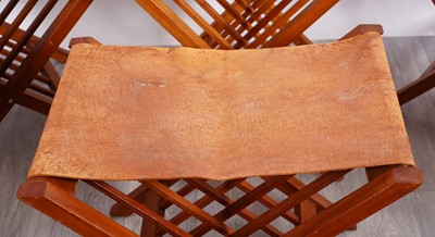 Lot 76 - A set of nine Kenyan folding stools