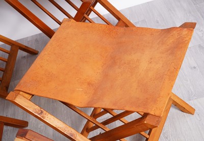 Lot 76 - A set of nine Kenyan folding stools