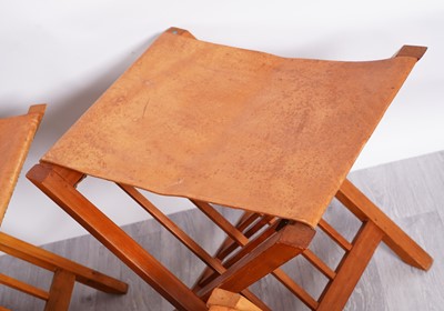Lot 76 - A set of nine Kenyan folding stools