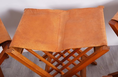 Lot 76 - A set of nine Kenyan folding stools