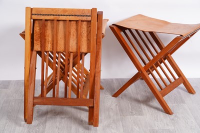 Lot 76 - A set of nine Kenyan folding stools