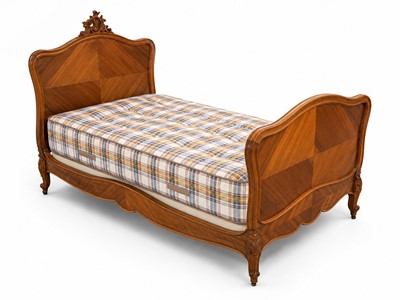 Lot 77 - A pair of French Rococo style walnut beds