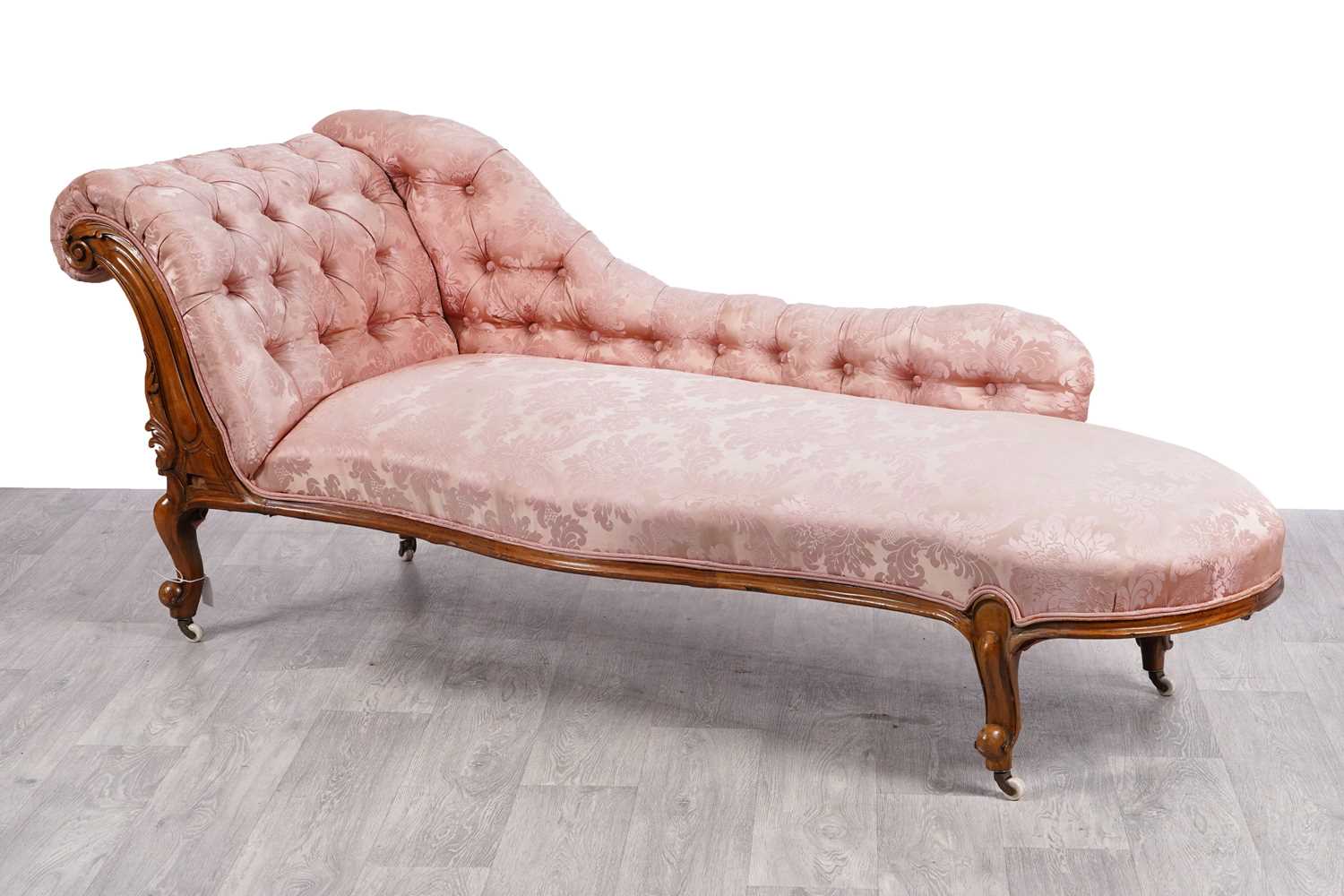 Lot 79 - A Victorian walnut framed chaise longue
