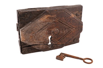 Lot 120 - A 17th Century wooden cased door lock and key