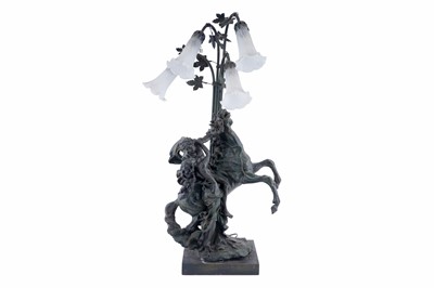 Lot 109 - A bronze effect figural table lamp
