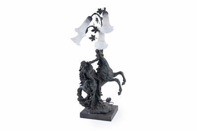 Lot 109 - A bronze effect figural table lamp
