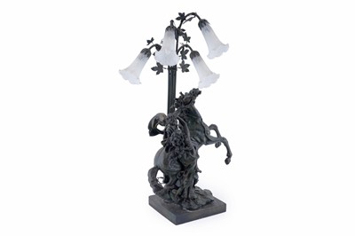 Lot 109 - A bronze effect figural table lamp