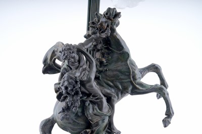 Lot 109 - A bronze effect figural table lamp