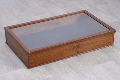 Lot 126 - A stained pine table top display cabinet