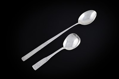Lot 14 - An Elizabeth II silver sugar spoon; and a longer cocktail stirring spoon