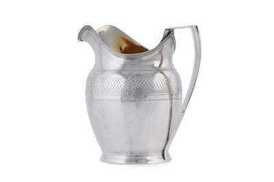 Lot 54 - A George III silver cream jug