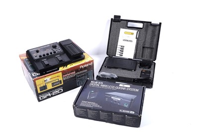 Lot 317 - A Roland guitar synth; and two wireless systems