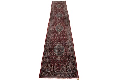 Lot 545 - A hand-knotted Persian Bidjar runner